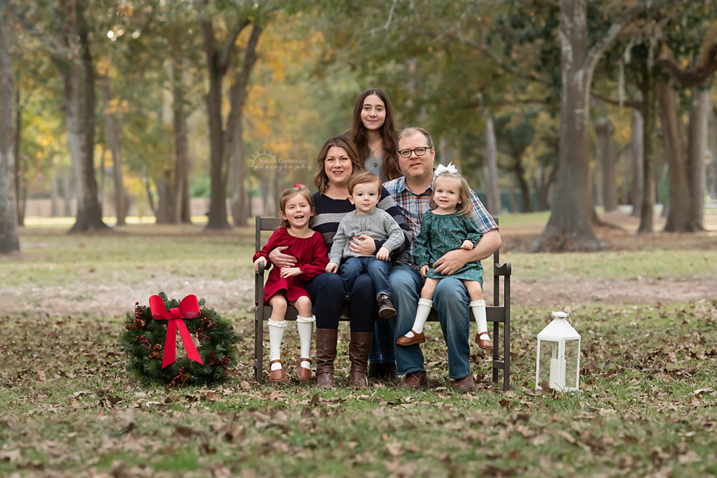 family of six at outdoor photoshoot for family Christmas photos in Cypress, Texas