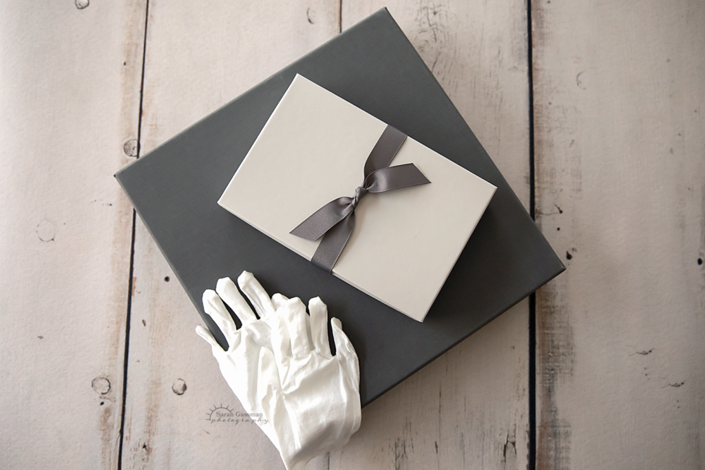 gift boxes and photography gloves