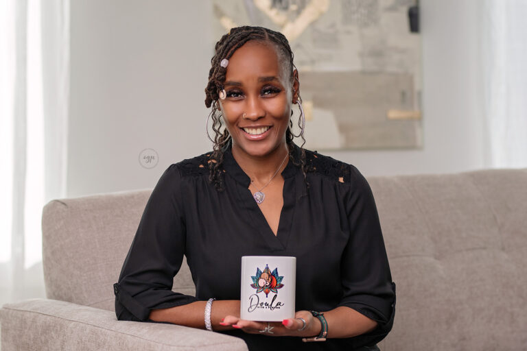 Houston birth doula holding branded coffee cup