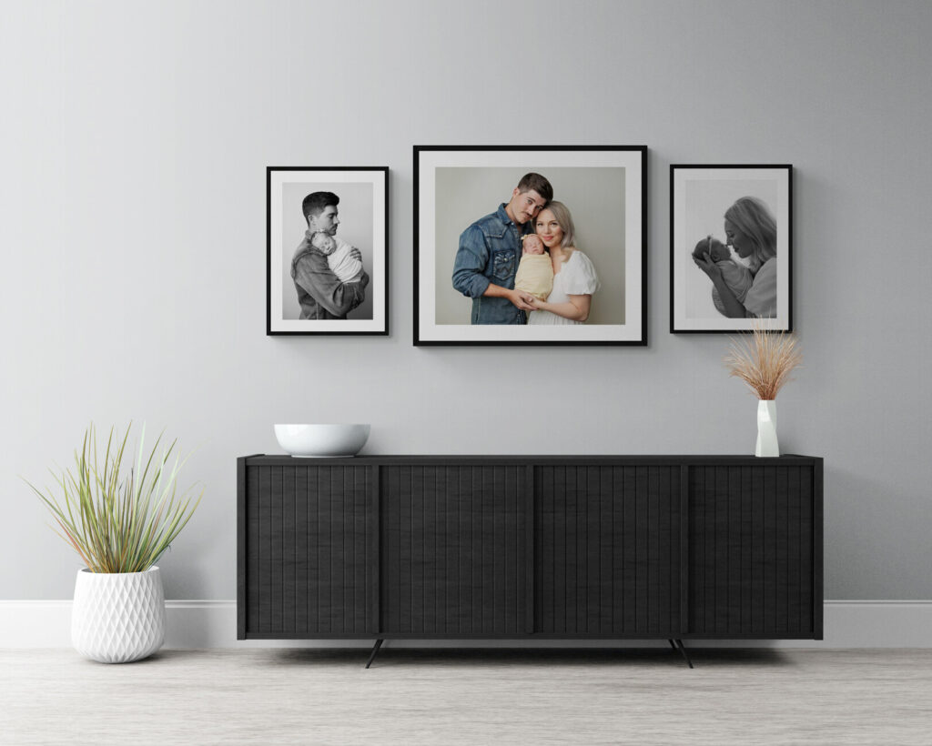 framed wall art photos of mom, dad, and new baby from in-home newborn photo session